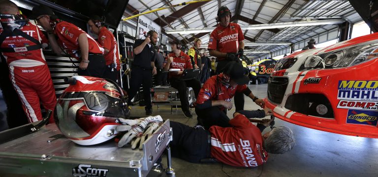 The HSM team in the garage during practice at Sonoma