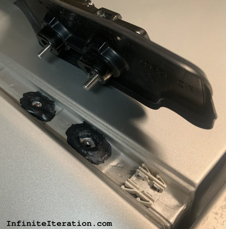 Weather-trim adhesive applied around rear mounting holes