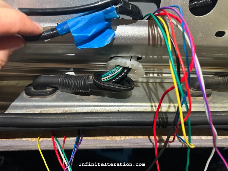 Running wires through boot to hatch